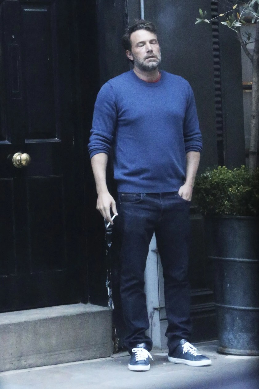 Ben Affleck, exhausted, smoking a cigarette